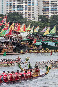 group of people racing dragon boat thumbnail