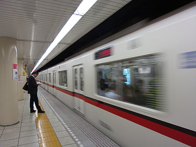 man standing infront of train thumbnail