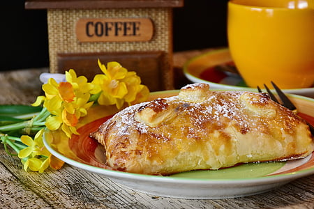 brown bun with sauce on plate thumbnail