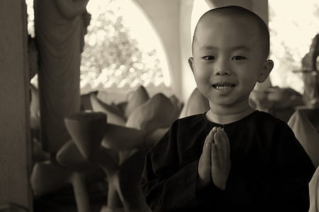 boy in black crew-neck shirt grayscale photo thumbnail