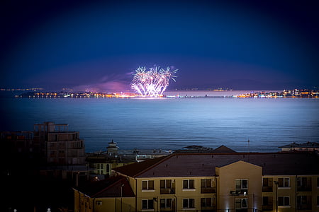 fireworks near body of water thumbnail