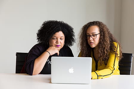 Photography of Women Using Laptop thumbnail