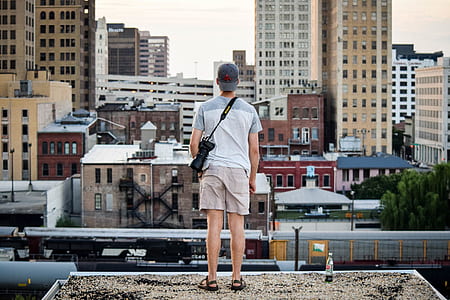 person standing on the roof-top thumbnail