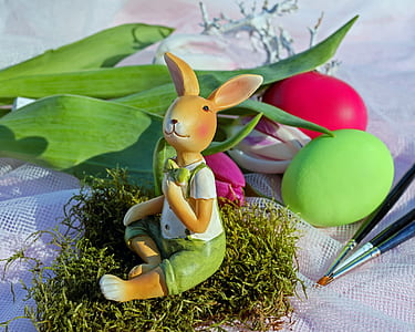 white and green dressed brown bunny ceramic figurine thumbnail