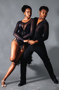 man and woman posing for a dance inside room thumbnail