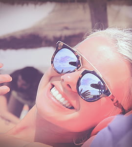 woman taking close-up selfie thumbnail