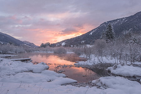 snow covered mountain during golden hours thumbnail