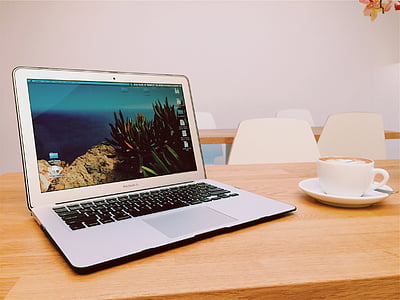 MacBook Air near cup of coffee thumbnail