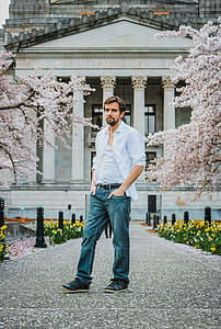 man standing in front of Legislative Building at daytime thumbnail
