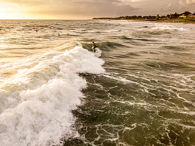 sea waves during daytime thumbnail