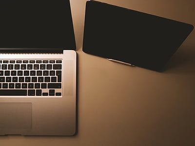MacBook Pro beside iPad thumbnail