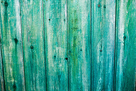 Closeup shot of a green wood fence. High-resolution download thumbnail