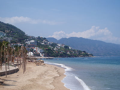 village near the ocean photography thumbnail