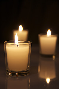 shallow focus photography of white tealight candles thumbnail