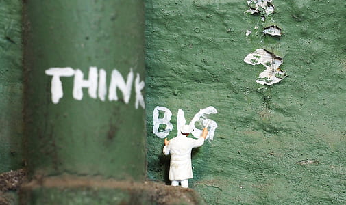 man painting on wall thumbnail
