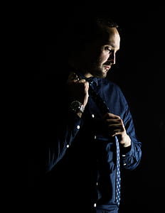 man holding necktie thumbnail