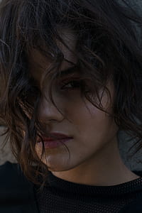 woman wearing black crew-neck blouse thumbnail