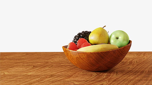 Bowl of fruit on a table. thumbnail