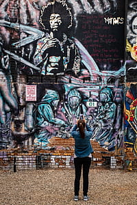 Photography of a Woman Taking Picture thumbnail