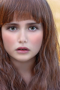woman with brown curly hair thumbnail