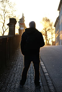 person standing on sidewalk thumbnail