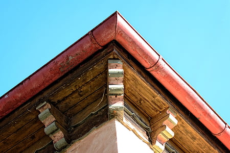 brown and red wooden ceiling at daytime thumbnail