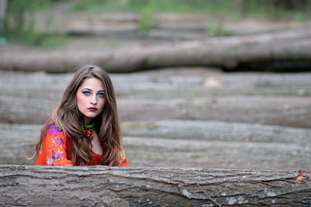 woman wearing orange top thumbnail