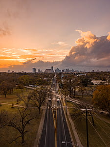 areal view photo of road and rail way during sunset thumbnail
