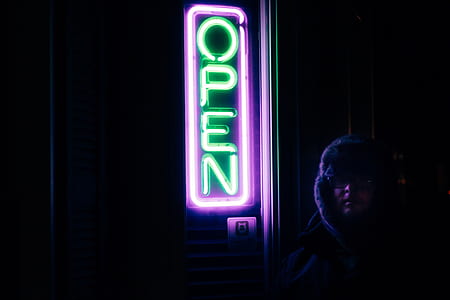 turned on purple and green open neon signage thumbnail