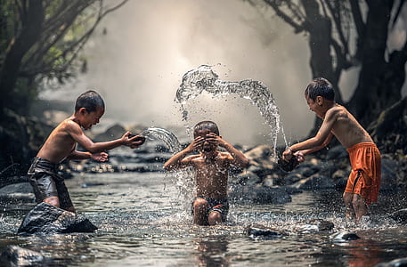 children playing on body of water thumbnail