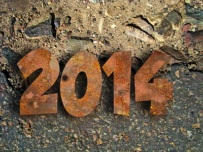 brown 2014 text on gray sand thumbnail