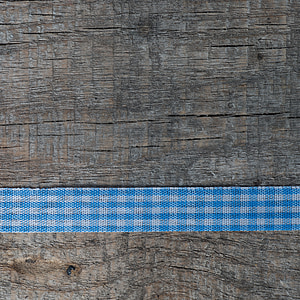 blue strap on gray wooden surface thumbnail