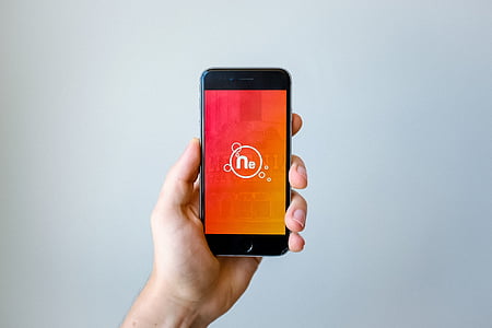 person holding space gray iPhone 6 thumbnail