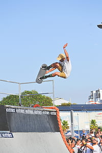 man playing skateboard while doing tricks thumbnail
