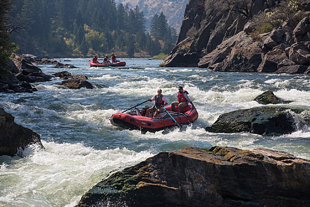 people riding boat near body of wate thumbnail
