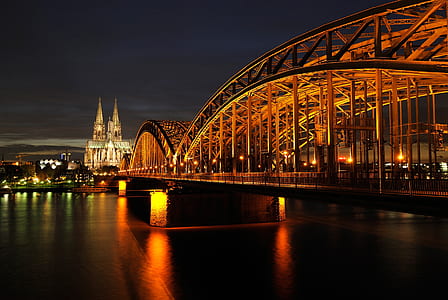 suspension bridge cityscape at night thumbnail