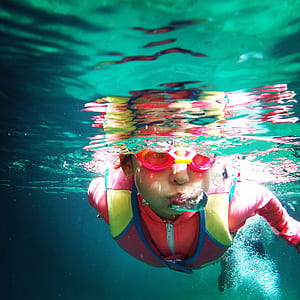 boy snorkeling underwater thumbnail