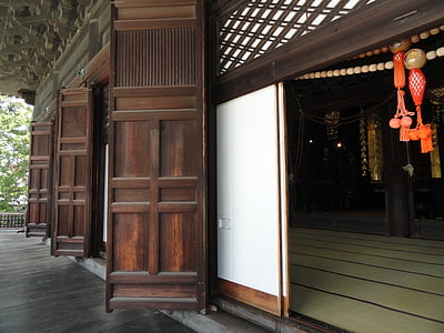 opened brown and white door thumbnail