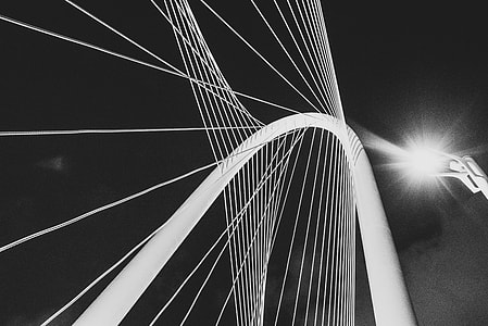 grayscale photo of bridge suspension cables thumbnail