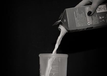 person holding carton thumbnail