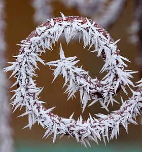 close-up photo of brown metal frame coated with snow thumbnail