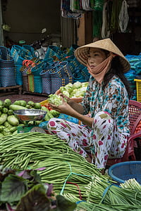 woman sitting holding cabbage thumbnail