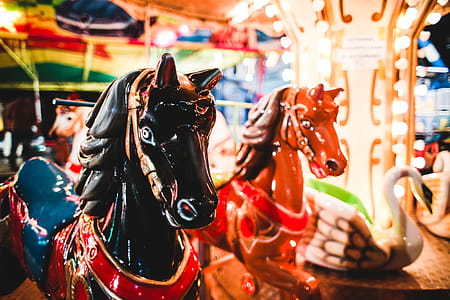 Traditional Carousel Horses on a Fun Fair Ride thumbnail