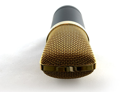 black and gold condenser microphone on white surface thumbnail