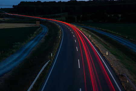 timelapse photography of asphalt road during nighttime thumbnail