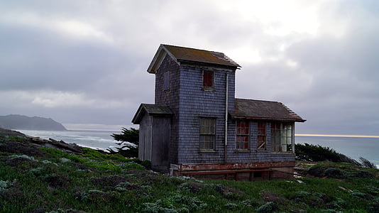gray house near sea at daytime thumbnail