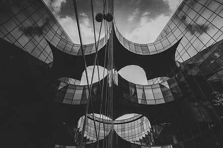 grayscale photography of glass building thumbnail