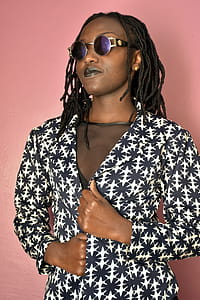 Woman Wearing White and Black Blazer thumbnail