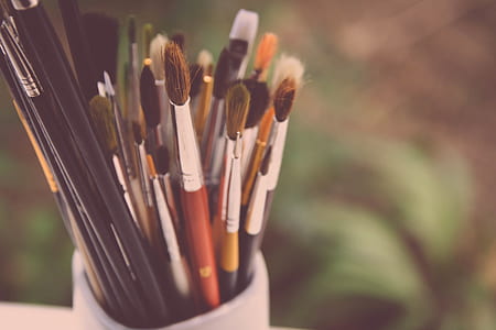 selective focus photography of paint brushes thumbnail