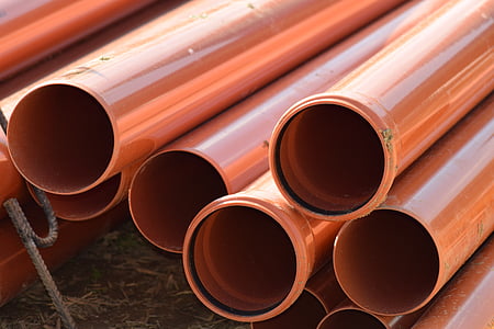 pile of brown PVC pipes thumbnail